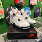 Air Jordan 4 white cement (USED)